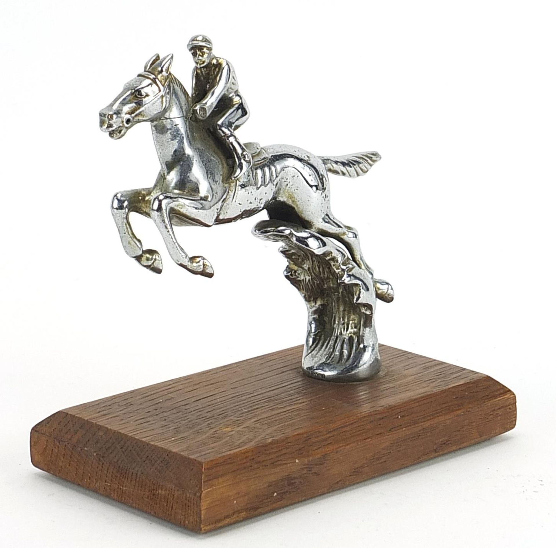 Desmo, vintage chrome plated car mascot in the form of a jockey on horseback raised on a later
