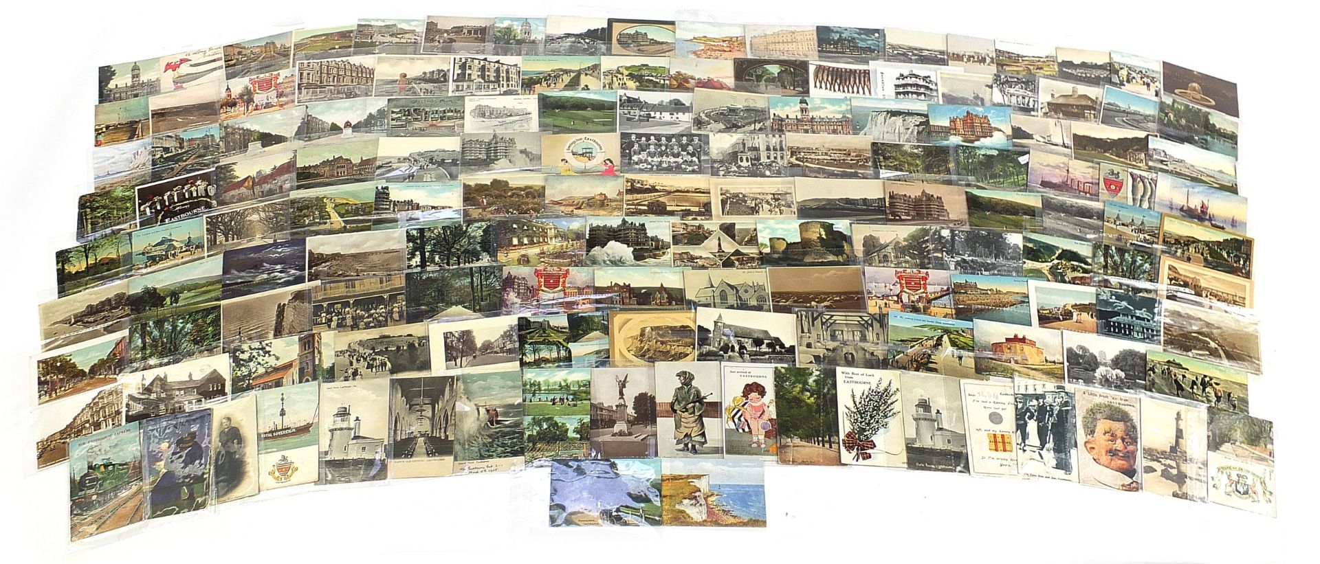 Collection of Eastbourne related postcards including Beachy Head, Royal Parade and Wish Tower