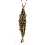 Chinese silver gilt filigree articulated fish pendant with turquoise eyes on a silver necklace, 5.