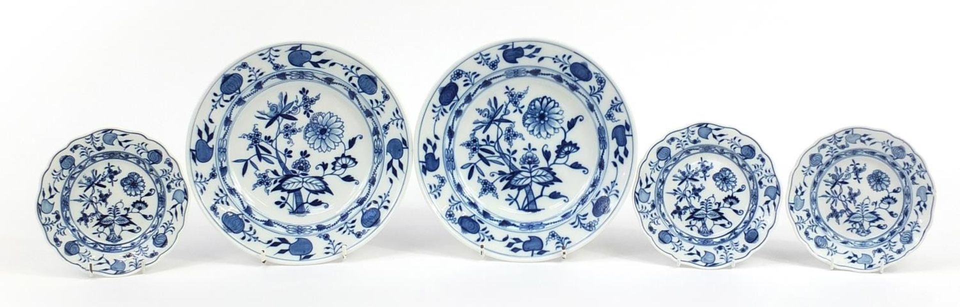 Meissen, German blue and white porcelain comprising two plates and three side plates, each hand