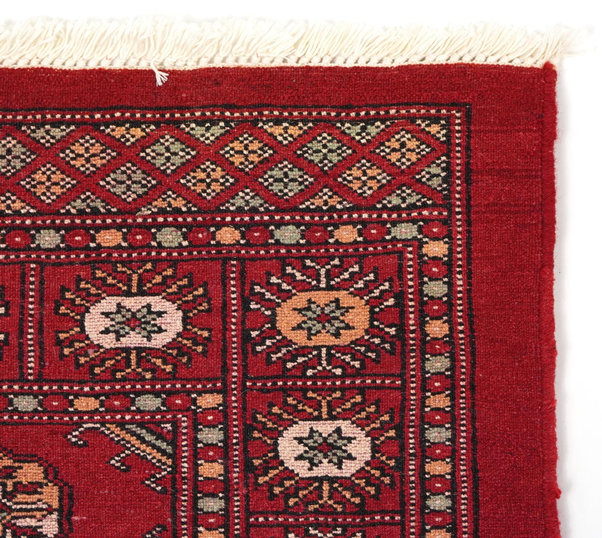 Rectangular Bokhara red ground rug having an all over geometric design, 154cm x 96cm - Image 6 of 6