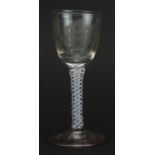 18th century wine glass with multiple opaque twist stem and bowl etched with a butterfly amongst a