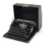 Vintage Underwood standard four bank keyboard black enamel typewriter with case