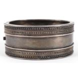 Victorian style silver hinged bangle impressed Standard to the interior, 6.5cm wide, 49.5g