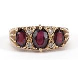 9ct gold garnet and clear stone ring, size Q/R, 3.7g