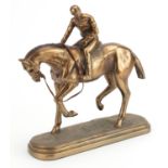 Bronzed jockey on horseback, 26cm in length