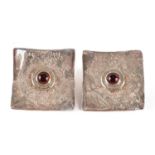 Pair of Modernist silver earrings set with cabochon amber coloured stones, 3cm x 3cm, 17.5g