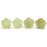 Set of four Chinese green jade flower head dishes, 12cm in diameter