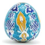 Turkish Iznik pottery hanging ball hand painted with flowers, 12.5cm high