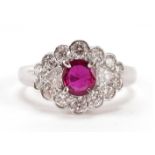 14ct white gold ruby and diamond cluster ring, the ruby 5.70mm x 5.24mm, size N, 3.7g