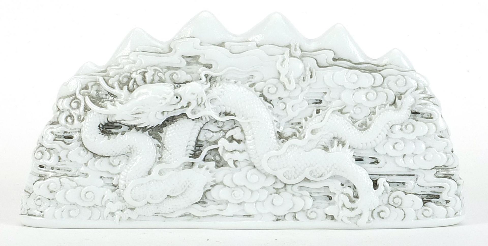 Chinese blanc de chine porcelain scholar's brush rest decorated in relief with dragons amongst - Image 2 of 3