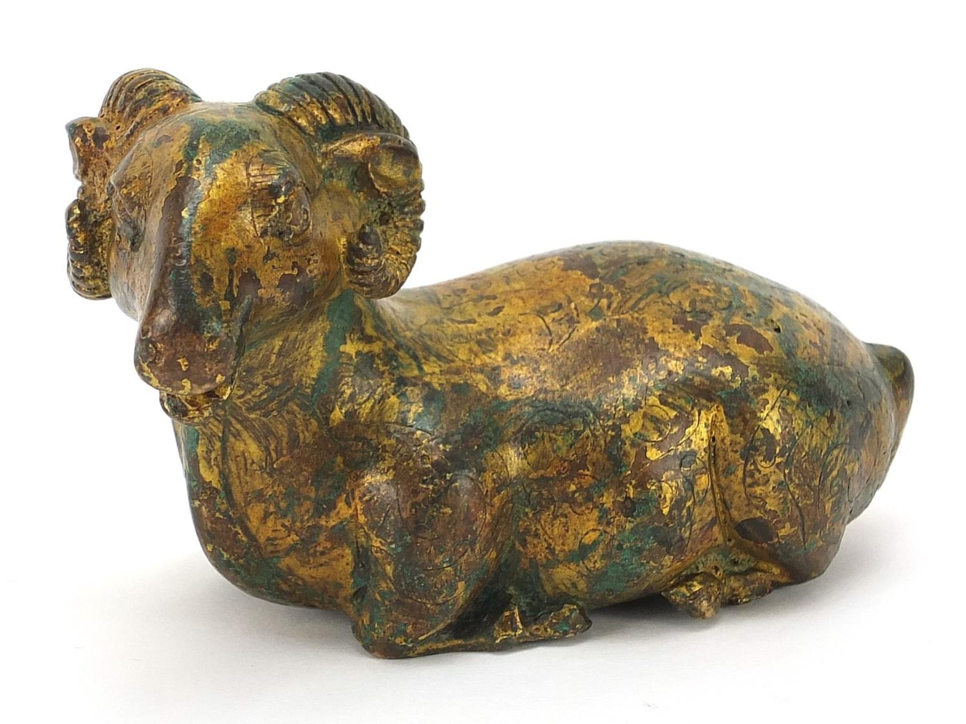 Chinese gilt bronze study of an archaic ram, 13cm in length