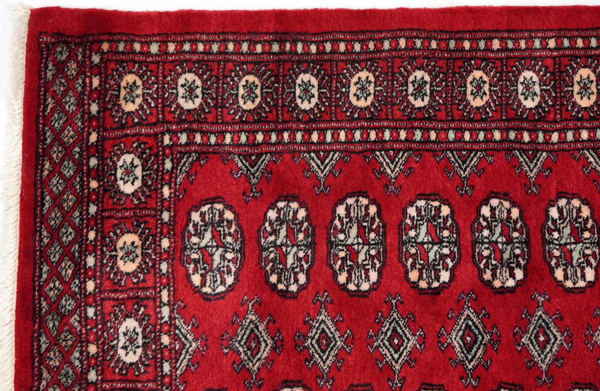 Rectangular Bokhara red ground rug having an all over geometric design, 154cm x 96cm - Image 2 of 6