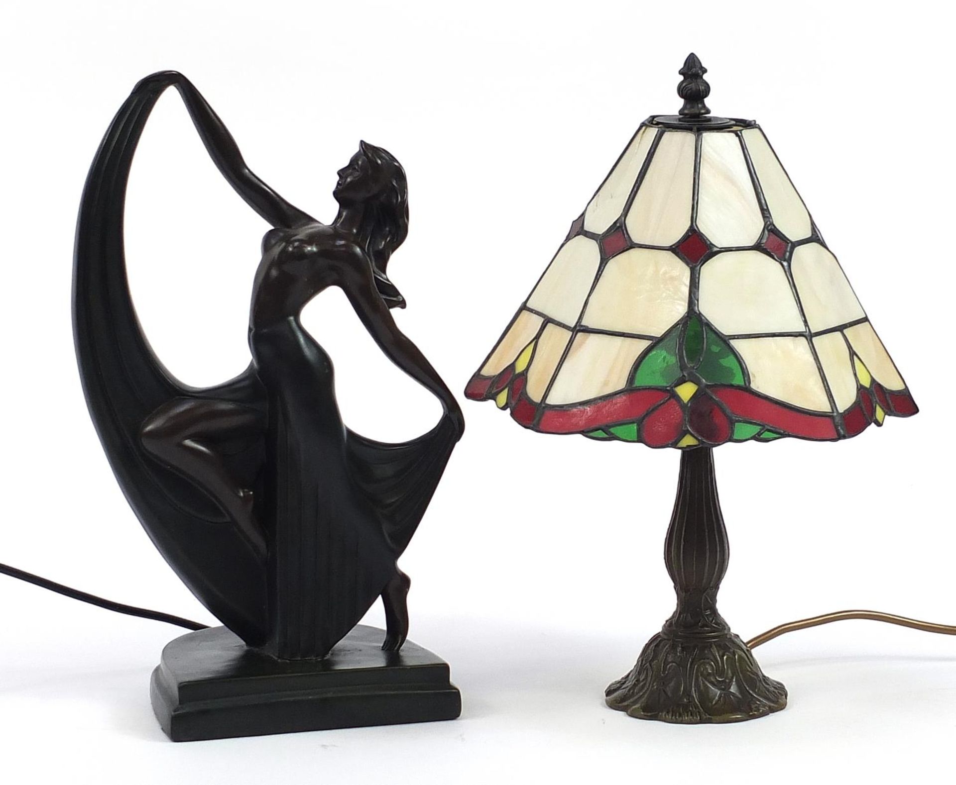 Bronzed Tiffany design table lamp with leaded glass shade and an Art Deco dancer table lamp, the