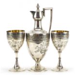 Antique silver plated ecclesiastical wine jug and two goblets with gilt interiors, engraved with