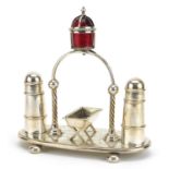 Victorian silver plated cruet set with salt and pepper in the form of lighthouses, 19cm wide