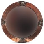 Manner of Liberty & Co, Arts & Crafts beaten copper wall mirror with bevelled glass plate, 49.5cm in