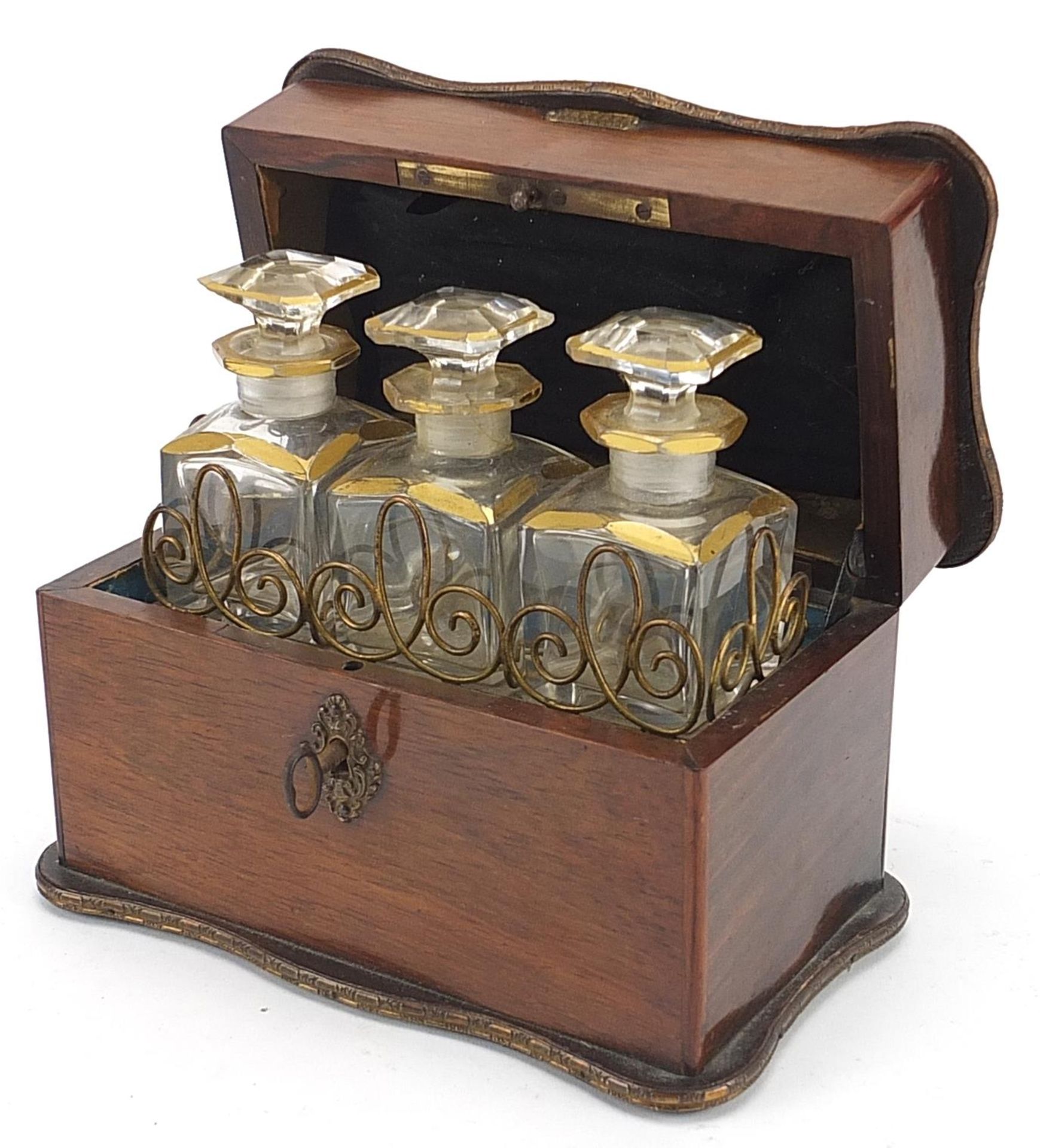 19th century rosewood mechanical action box housing three cut glass scent bottles with Brevete S. - Image 3 of 5