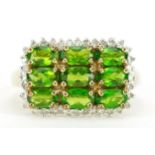 9ct gold diamond and green stone cluster ring, possibly peridot, size Q, 3.4g