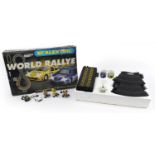 Scalextric World Rallye racing set with box together with three other Scalextric cars and two