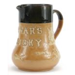 Royal Doulton stoneware Dewars Whiskey advertising hunting jug, 16.5cm high