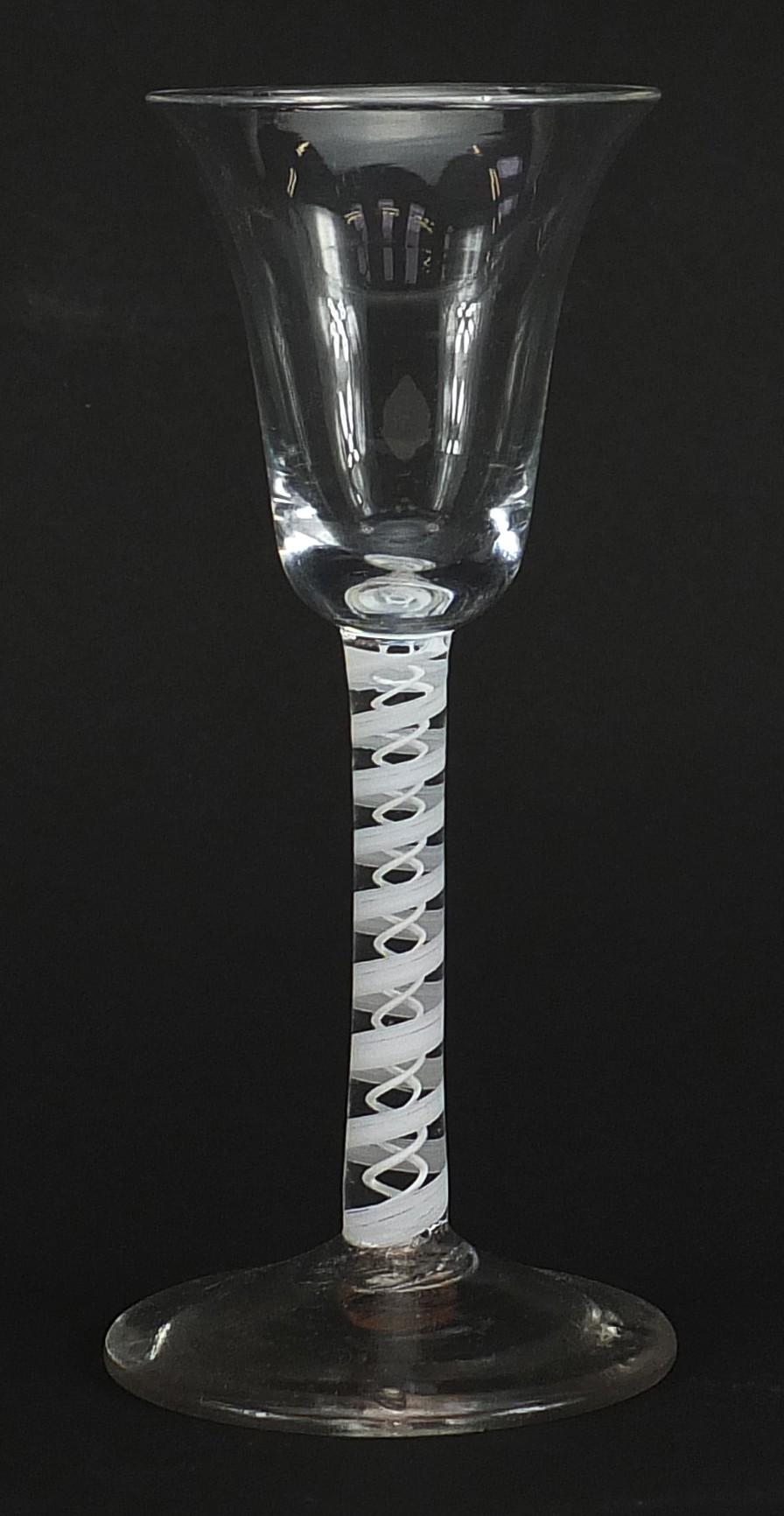 18th century wine glass with multiple opaque twist stem and bell shaped bowl, 16.5cm high