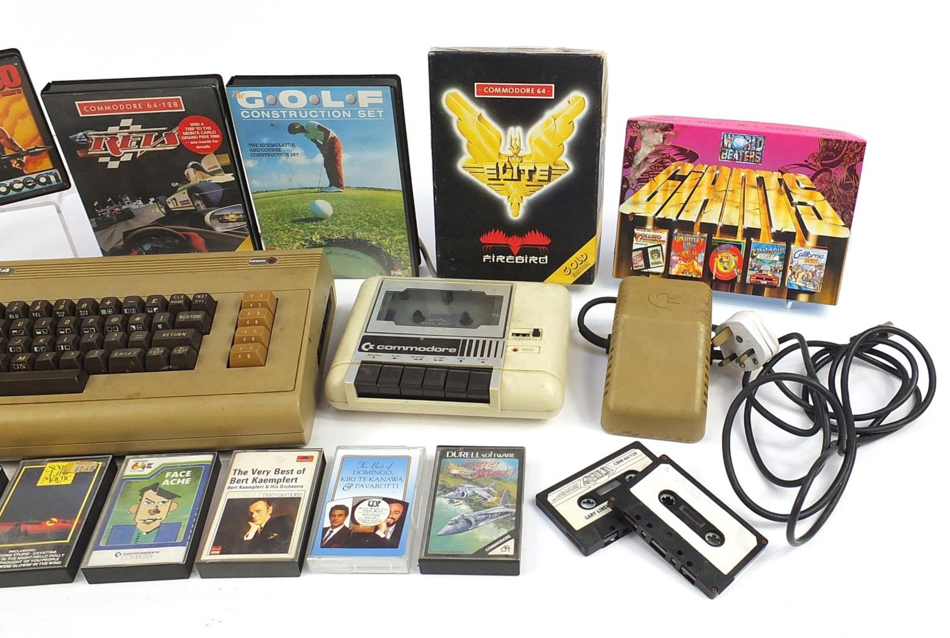 Vintage Commodore 64 console with a collection of games - Image 3 of 3