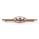9ct gold amethyst and seed pearl bar brooch housed in a leather box, 5cm wide, 2.3g