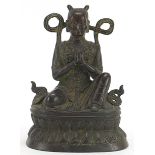 Tibetan patinated bronze figure of Buddha, 16cm high