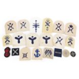 Group of military and naval interest cloth badges