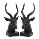Pair of bronzed gazelle head bookends, 38cm high