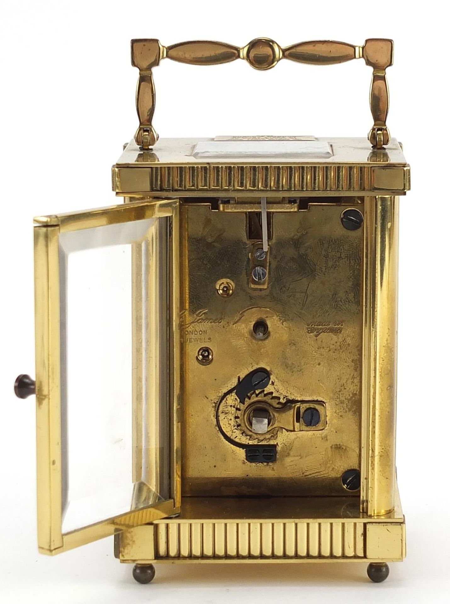 St James brass cased carriage clock with enamelled dial having Roman numerals, 11.5cm high - Image 3 of 6