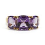 9ct gold amethyst three stone ring, size Q, 3.3g