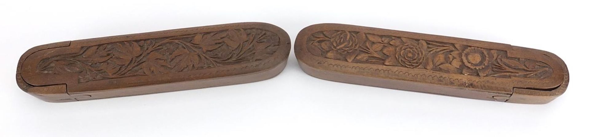 Pair of Islamic wooden pen boxes carved with leaves and flowers, each 24.5cm in length - Image 2 of 4