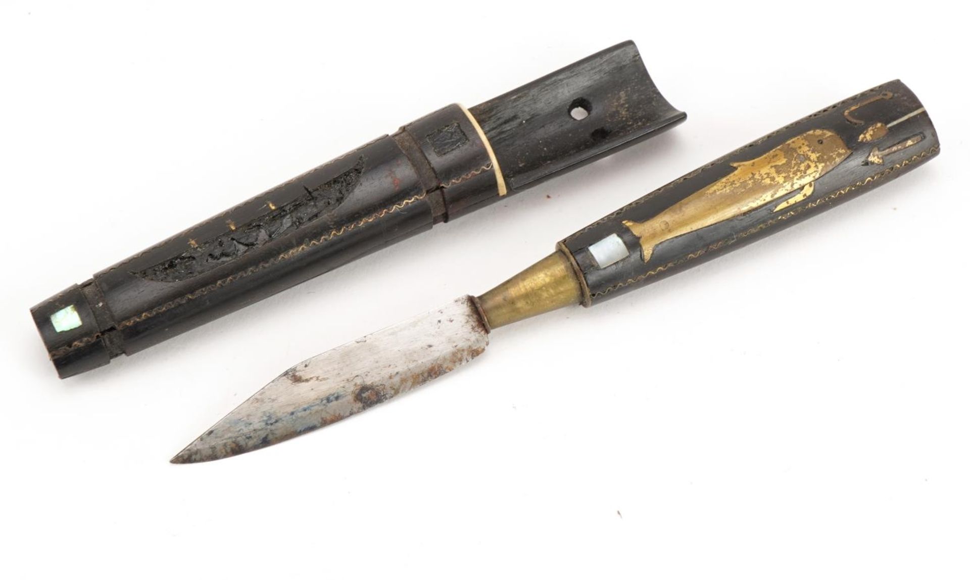 Whaling interest ebony knife housed in a scabbard inlaid with brass whale, carved with a boat and