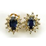 Pair of 9ct gold sapphire and diamond cluster stud earrings, 9mm high, 1.2g