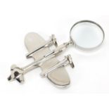 Novelty silver plated magnifying glass in the form of an aeroplane, 23.5cm in length