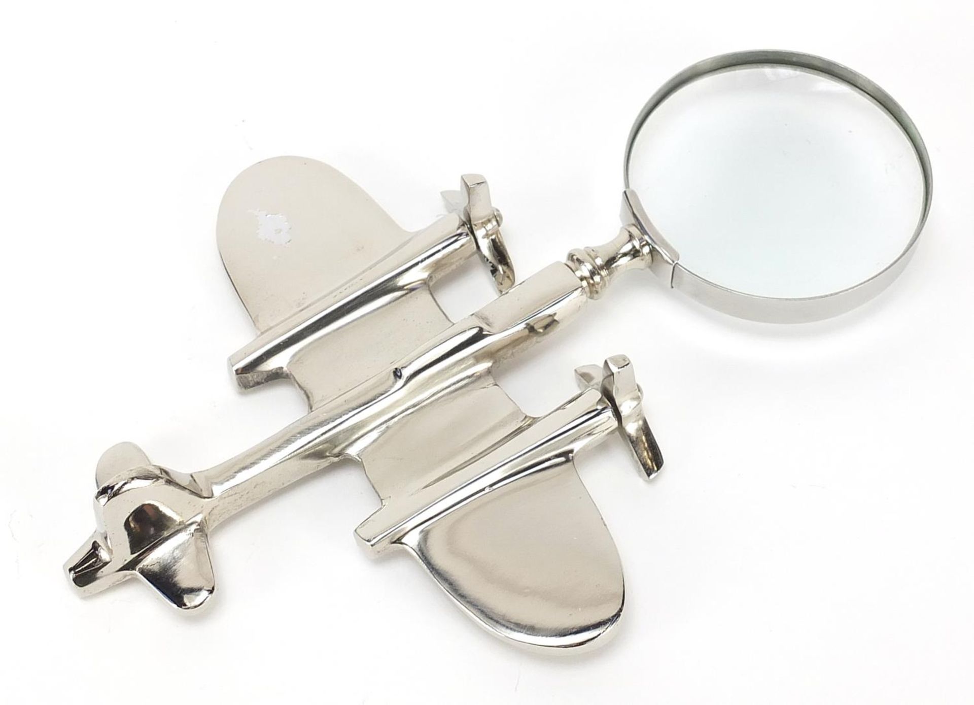 Novelty silver plated magnifying glass in the form of an aeroplane, 23.5cm in length