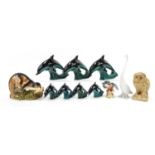 Collectable china animals including a Beswick kingfisher, Sylvac otter and Poole dolphins, the