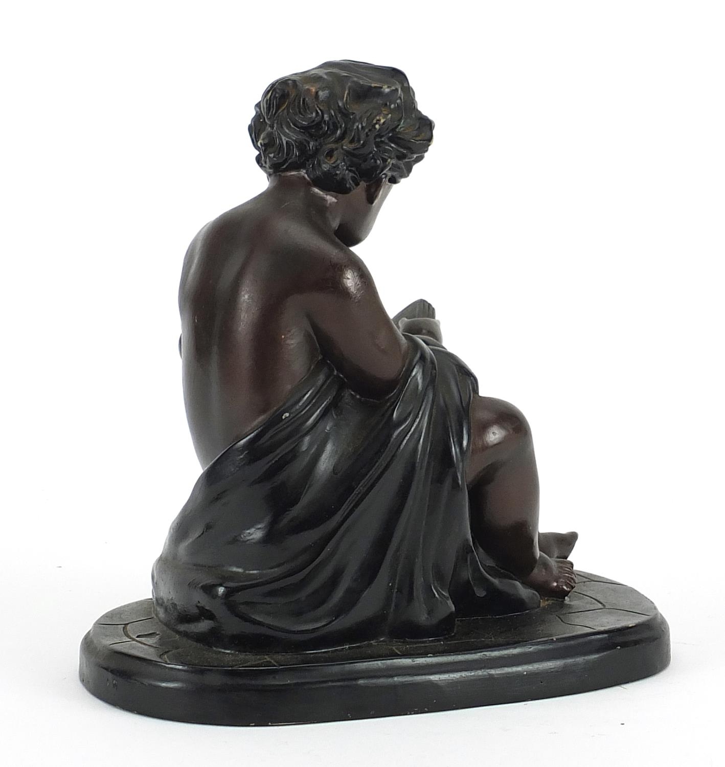 Bronzed figure of a young child reading a book, 17.5cm high - Bild 2 aus 3