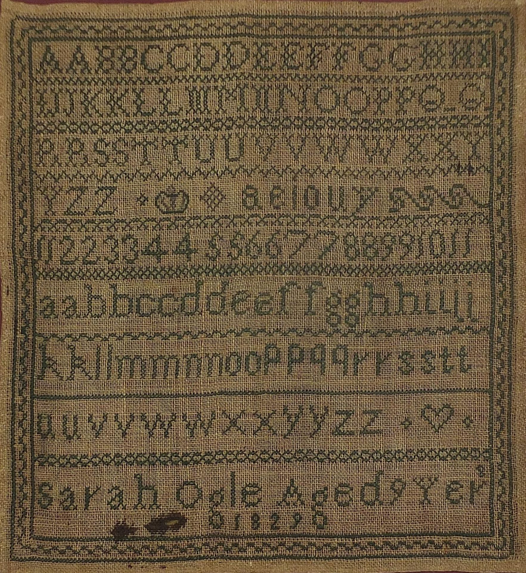 Early 19th century embroidered alphabet sampler worked by Sarah Ogle aged 9, 1829, framed and - Image 2 of 3