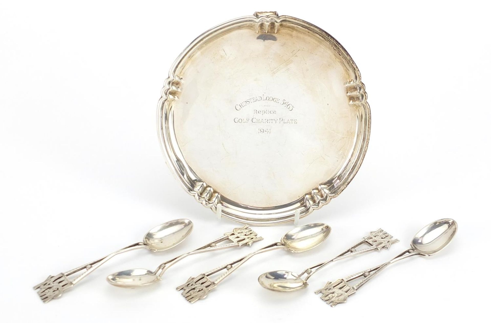 Golfing interest circular silver three footed salver and set of six teaspoons, the salver engraved