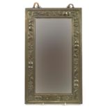 Rectangular brass framed wall hanging mirror embossed with fruit, with bevelled glass, 38cm x 23cm