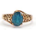 9ct gold blue topaz ring with pierced setting, size M, 2.3g