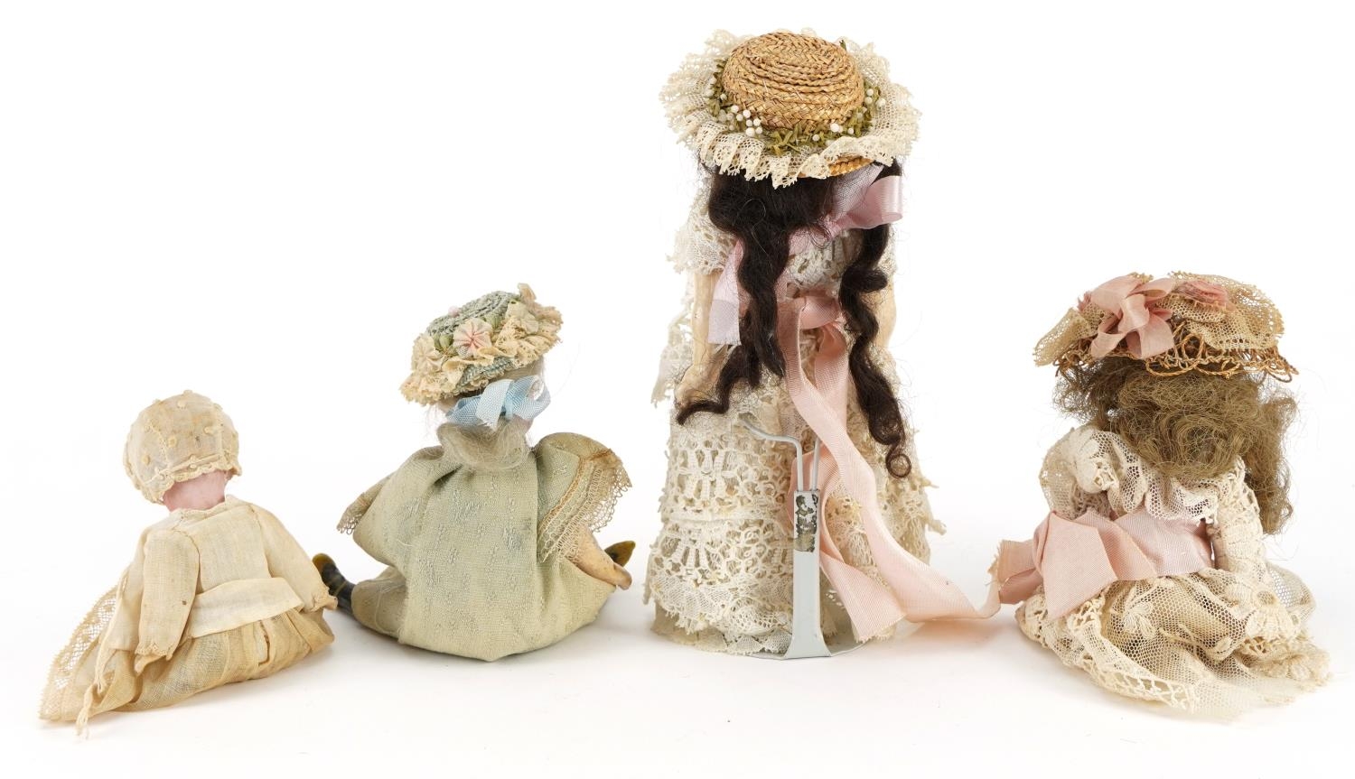 Four miniature bisque headed dolls, the largest 16cms high - Image 2 of 2