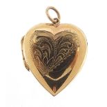 9ct gold love heart locket with engraved decoration, 2.2cm high, 3.8g