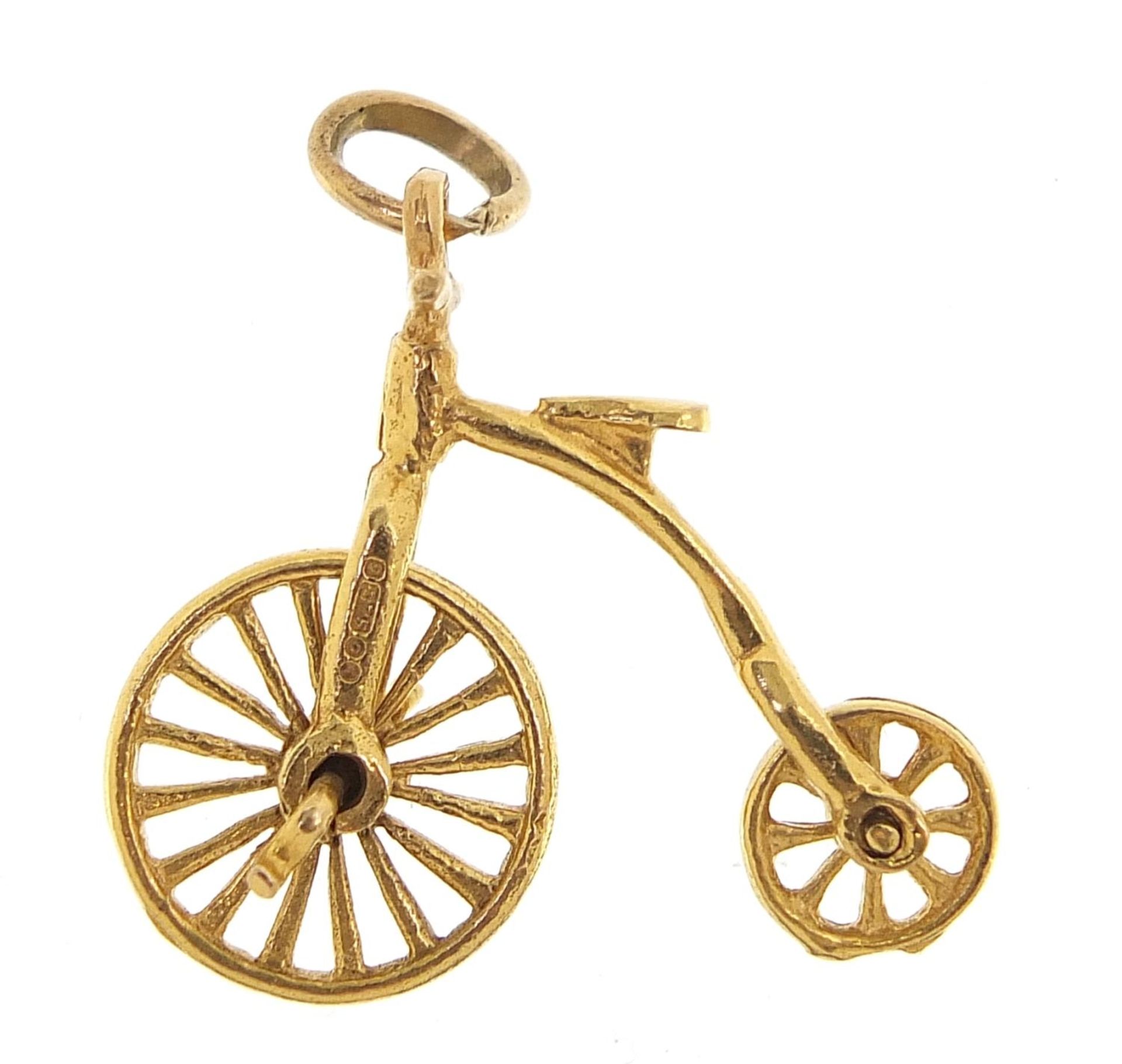 9ct gold penny farthing bike charm with rotating wheels, 2.5cm wide, 2.8g