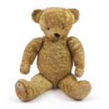 Vintage golden teddy bear with jointed limbs, 72cm high