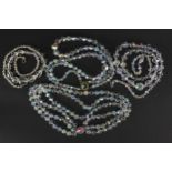 Four vintage crystal necklaces, the largest 64cm in length