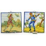 Pair of continental porcelain tiles hand painted with an archer and bird catcher, each 15cm x 15cm